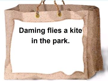 Daming flies a kite in the park._课件1