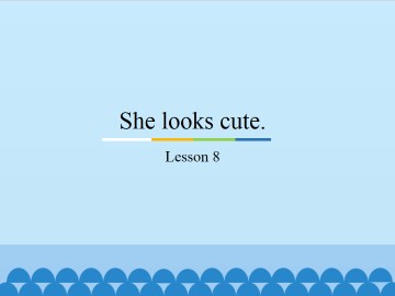 She looks cute.-Lesson 8_课件1