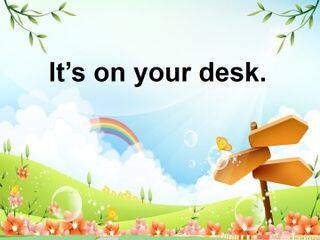 It's on your desk._课件1
