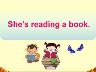 She's reading a book._课件1