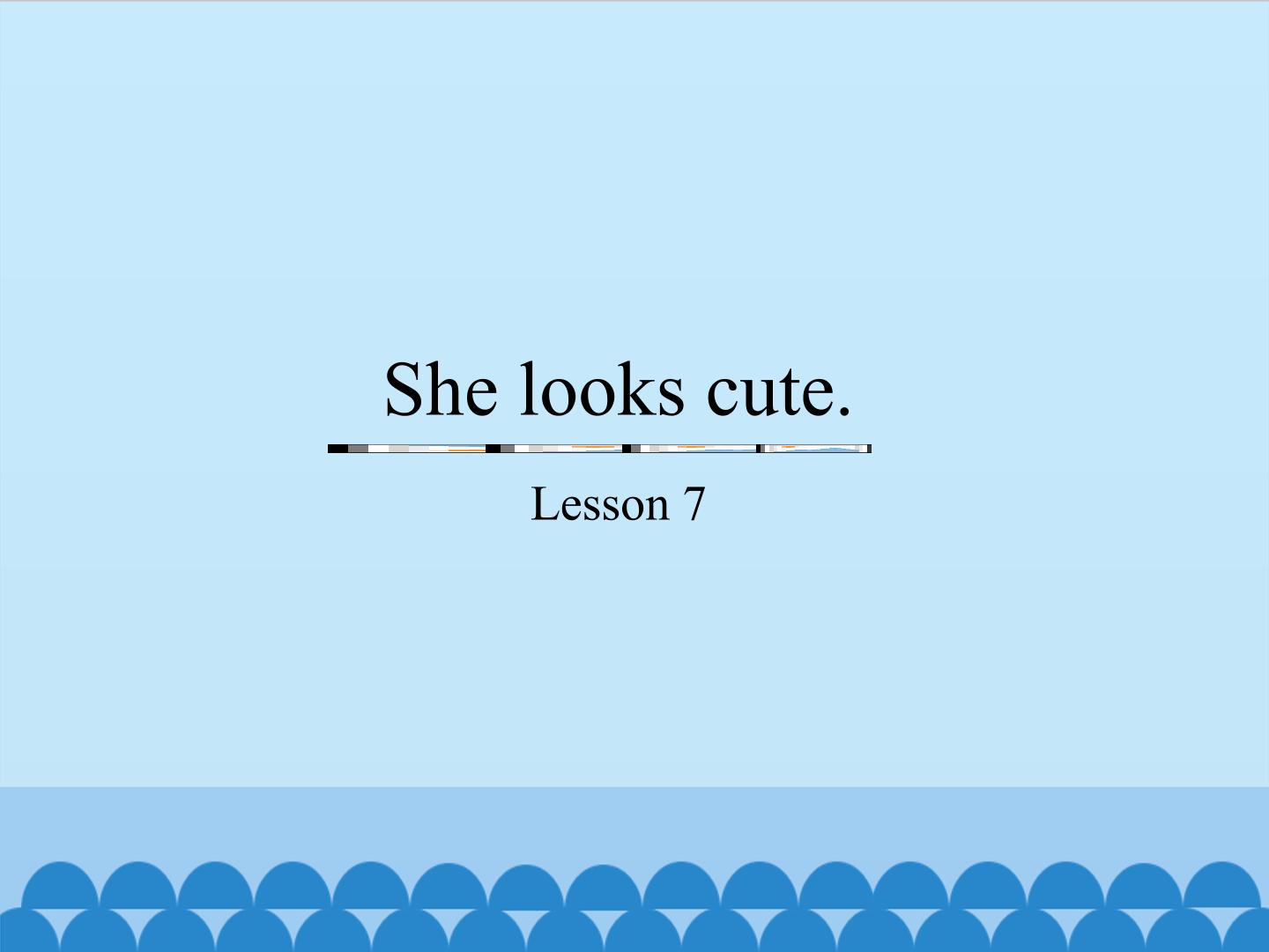 She looks cute.-Lesson 7_课件1