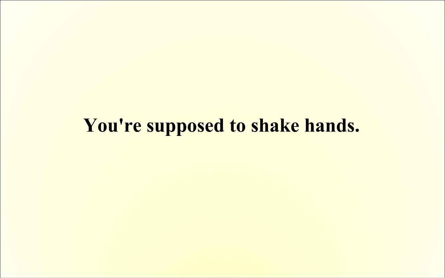 You're supposed to shake hands._课件14